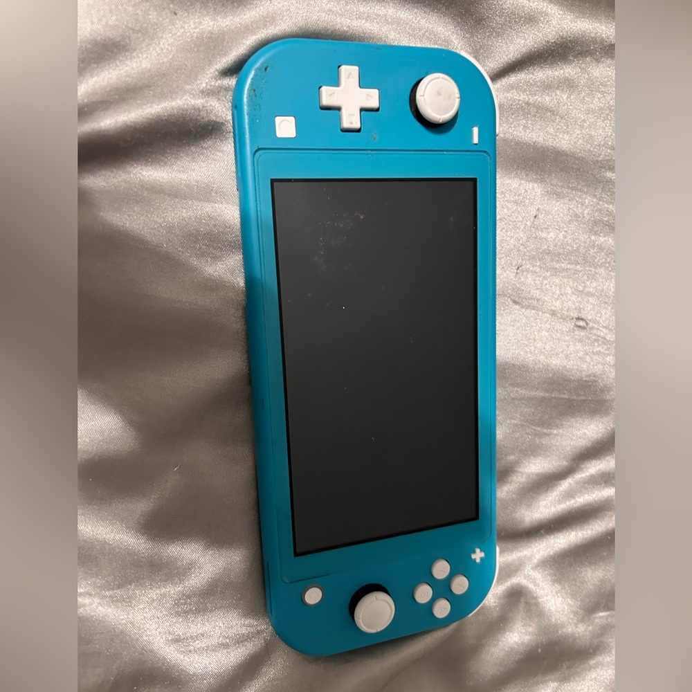 ‼️‼️Nintendo Switch Lite!!!
Practically new 
Selling Switch,case, and game
